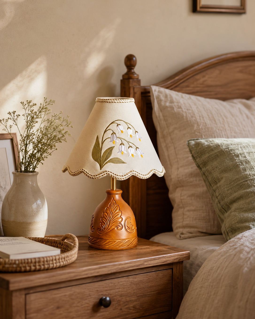 Detail of the braided trim and scalloped bottom edge of the lampshade.