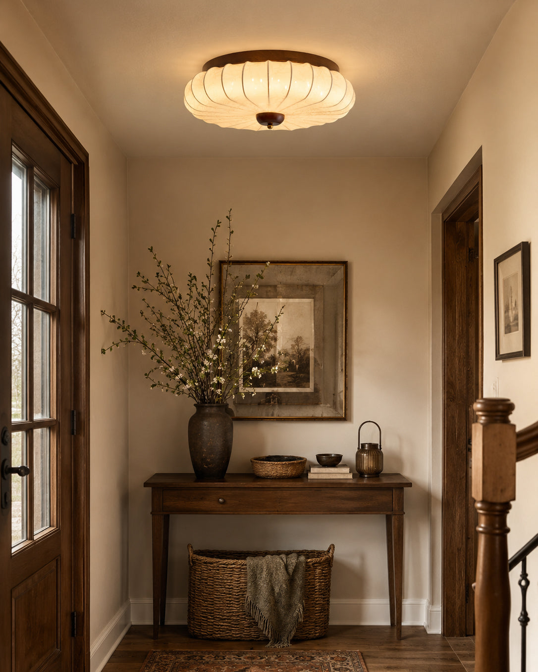 The Tate Walnut Flush Mount in a minimalist entryway.