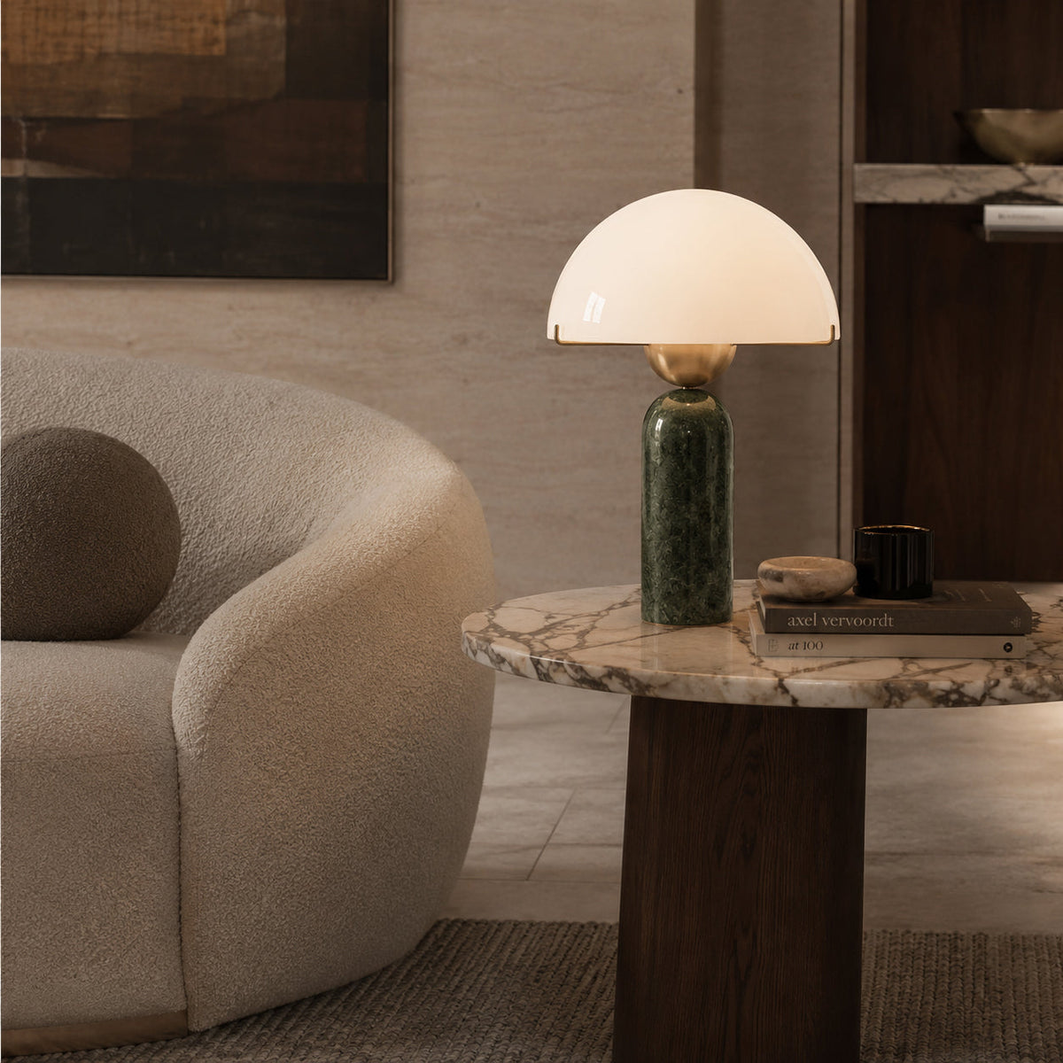 The lamp casting a moody glow in a dimly lit room.