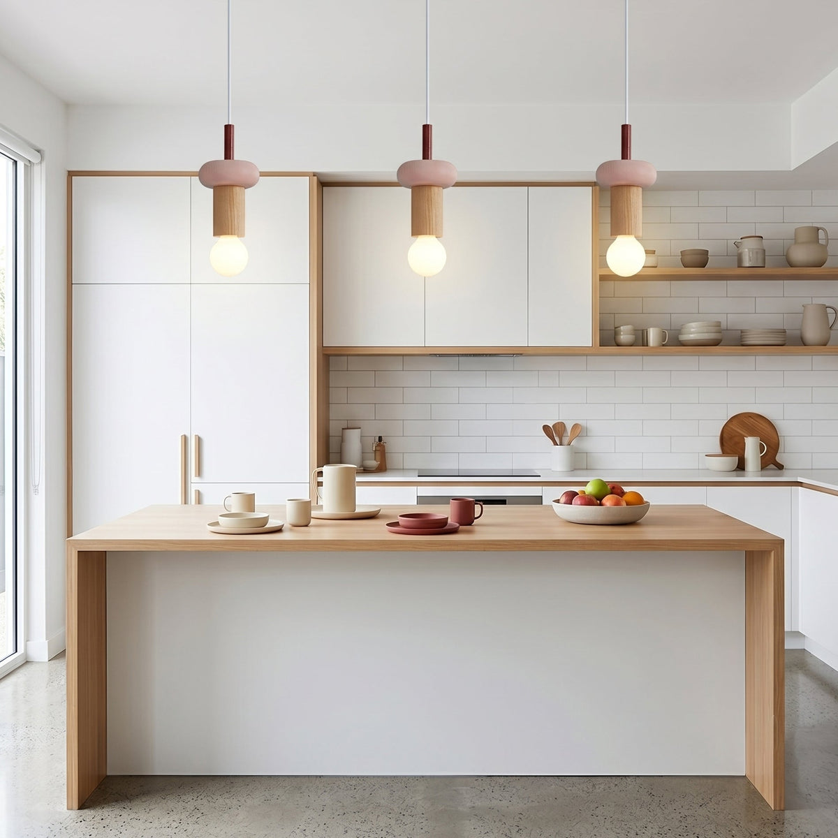 The white Klee Geometric Pendant Light hanging in a modern kitchen.