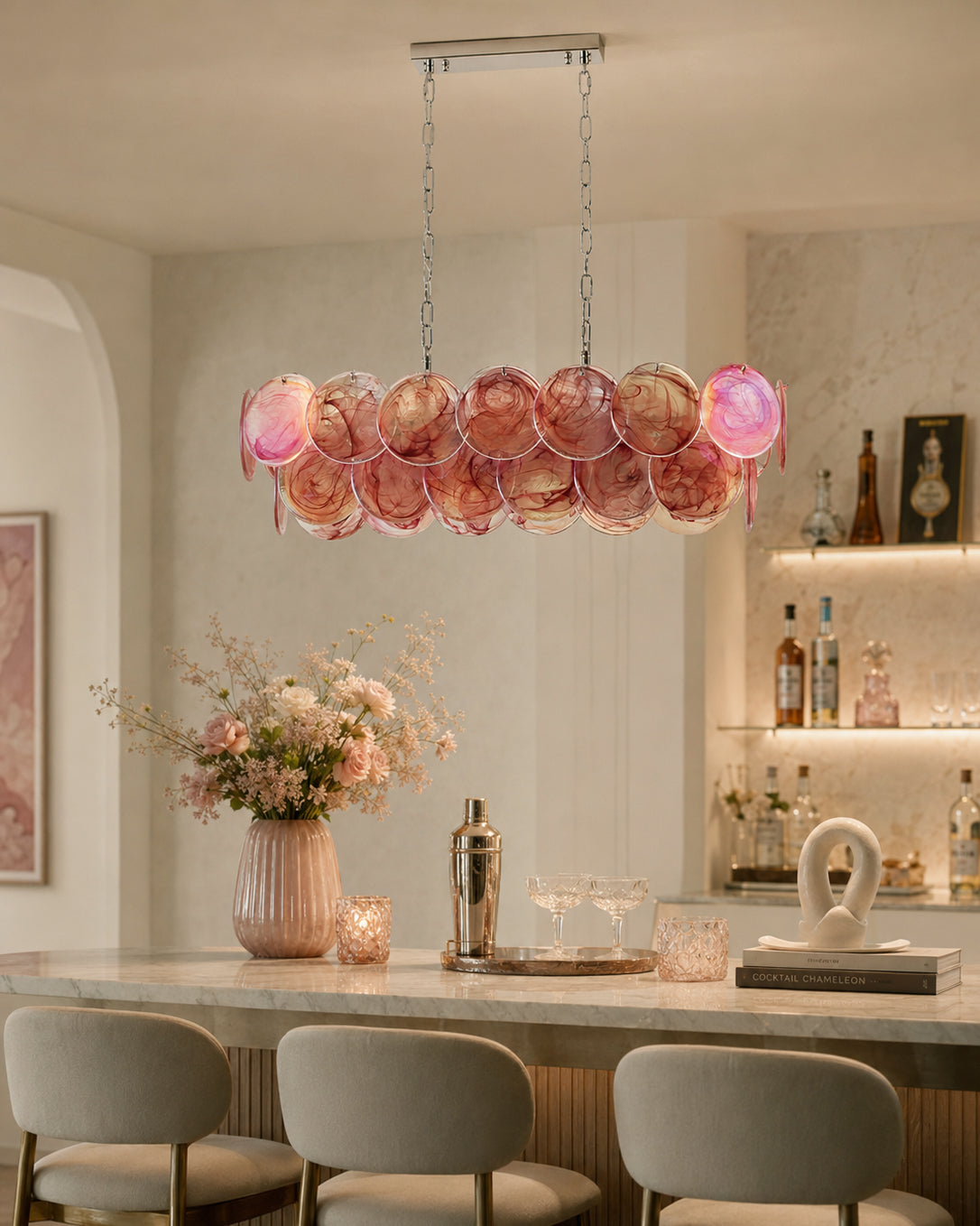 The Pavone Linear Chandelier in a classic white glass finish.