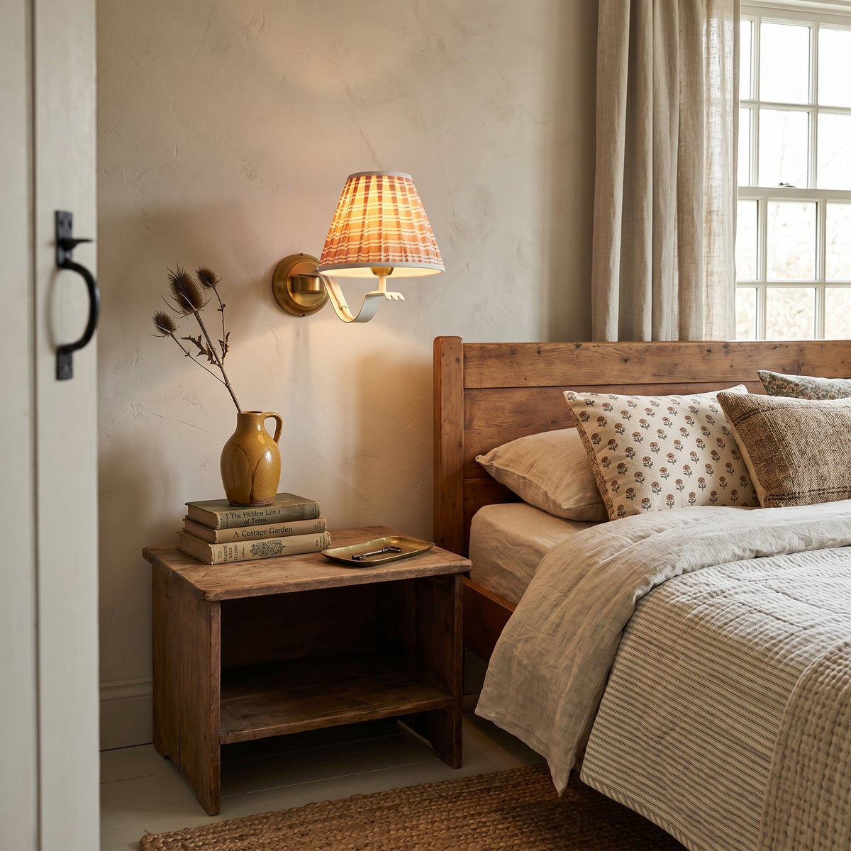 Angled view of the Penelope Pleated Wall Sconce.