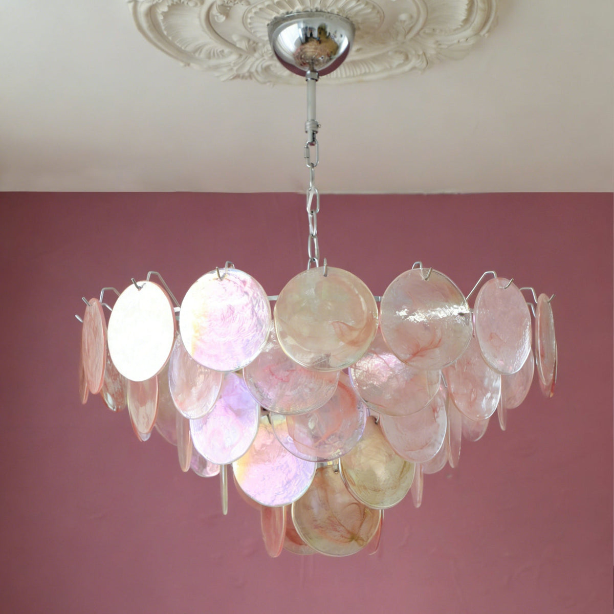 Close-up of the iridescent glass disks on the Brette chandelier.