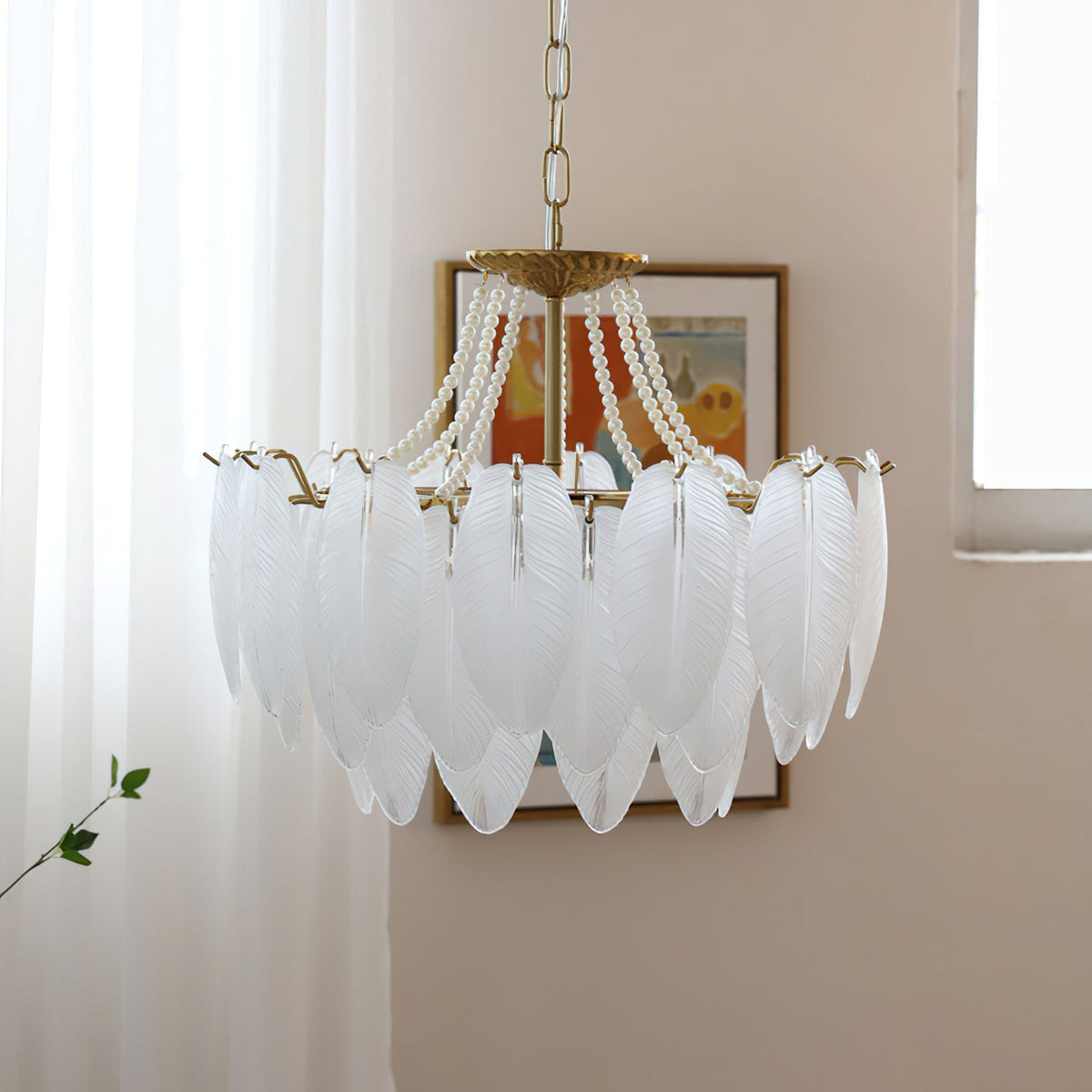 The Antheia Chandelier hanging in a stylish living room setting.