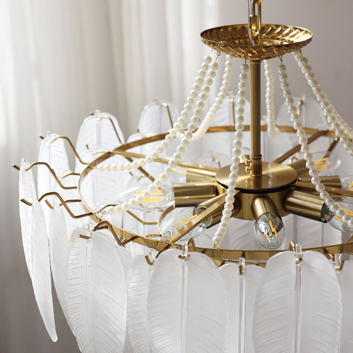 Antheia Chandelier against a dark wall to emphasize its luminosity.