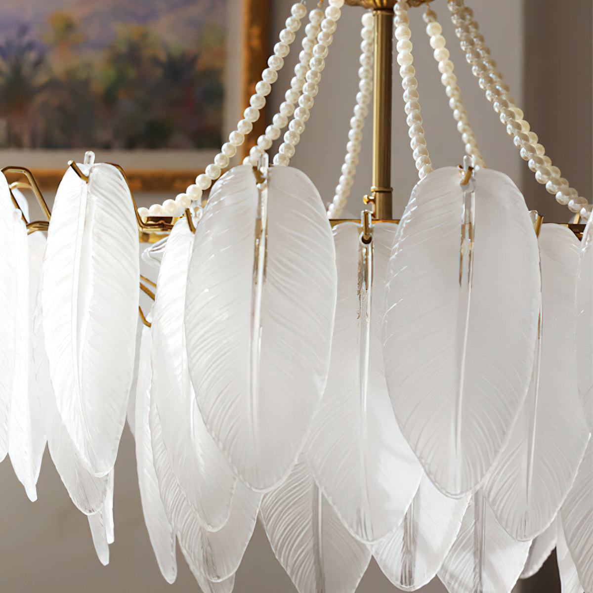 The warm light filtering through the semi-opaque white glass feathers.