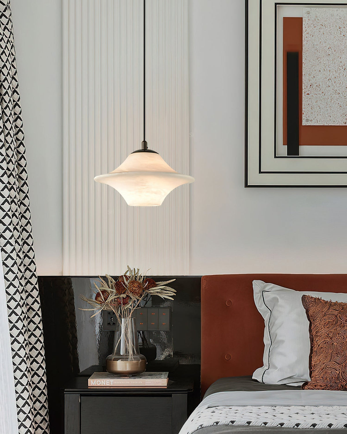 A single Beckett pendant light hanging in an entryway.
