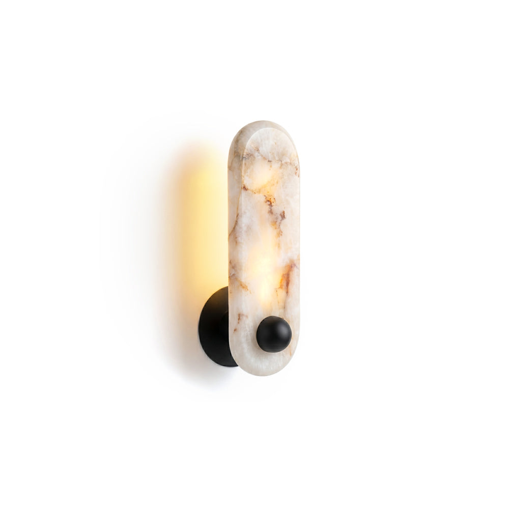 Breuer Alabaster Wall Sconce in a modern living room setting.