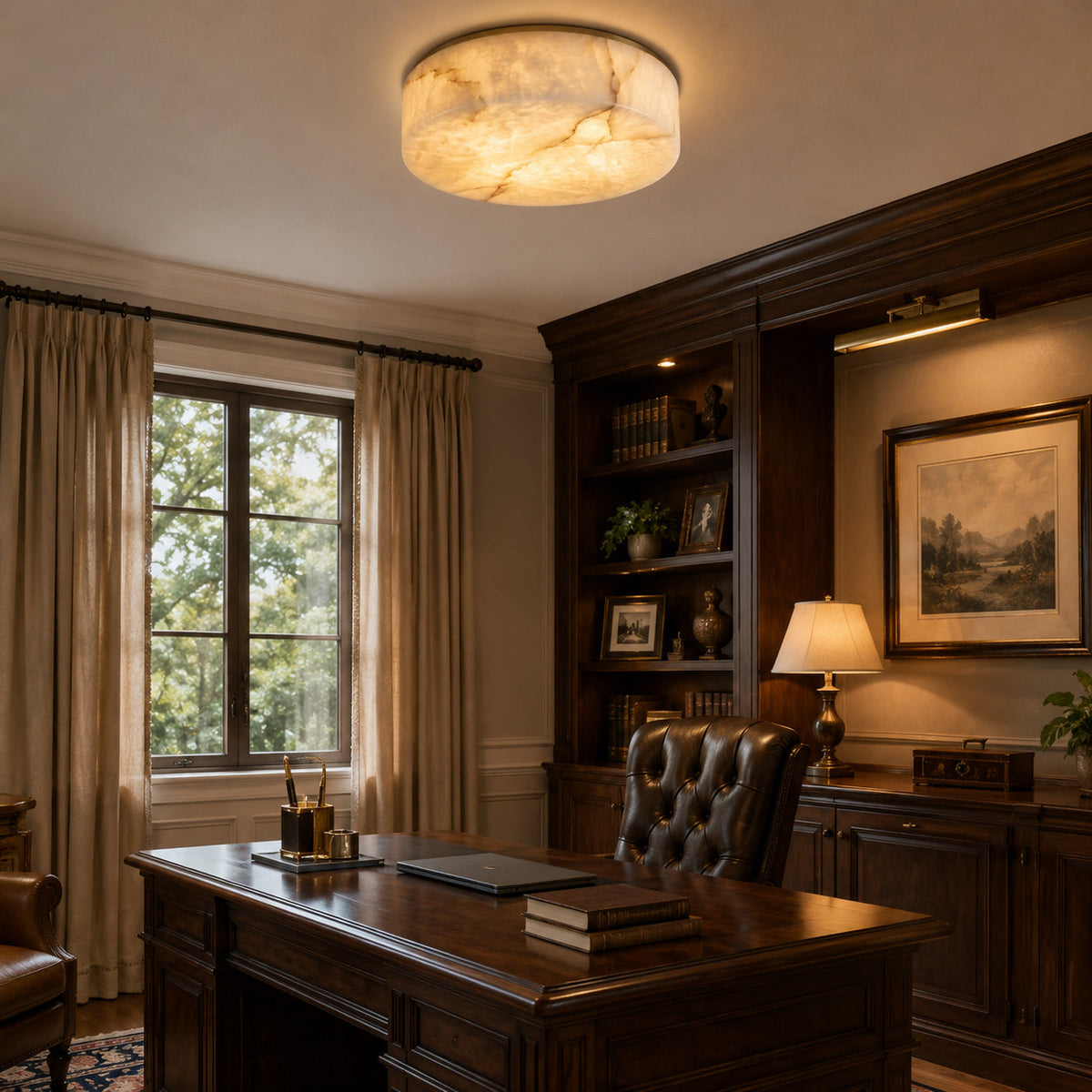 The alabaster ceiling mount illuminated in a dark room, showing a warm glow.