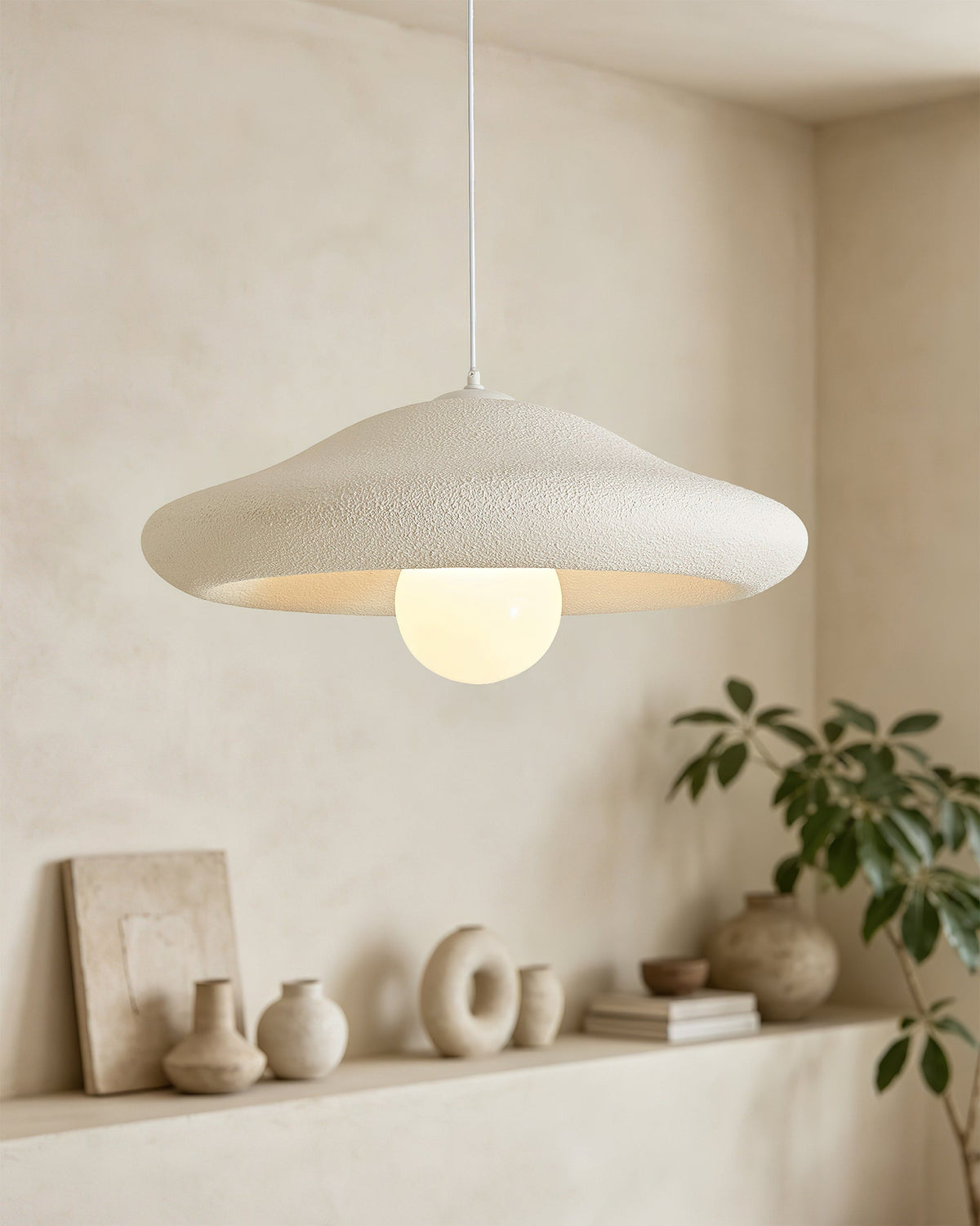 Side profile of the Chalk Pendant Light, showing its wide, shallow dome shape.