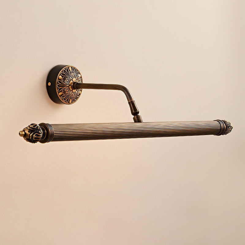 Close-up on the texture and luster of the antique brass finish.