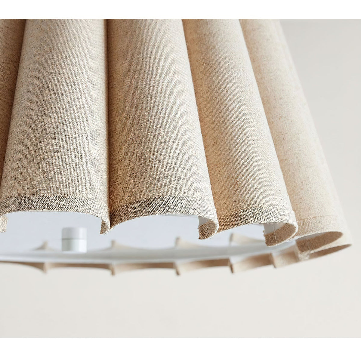 A view from below the Colette flush mount, showing the light diffuser.