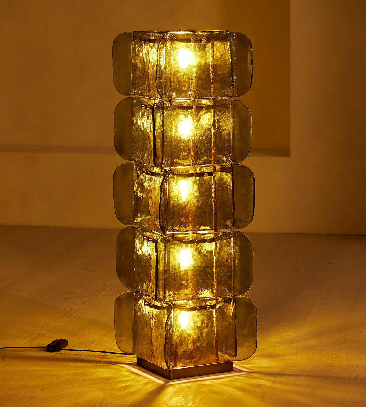 A pair of Cubo Totem Floor Lamps framing a doorway.