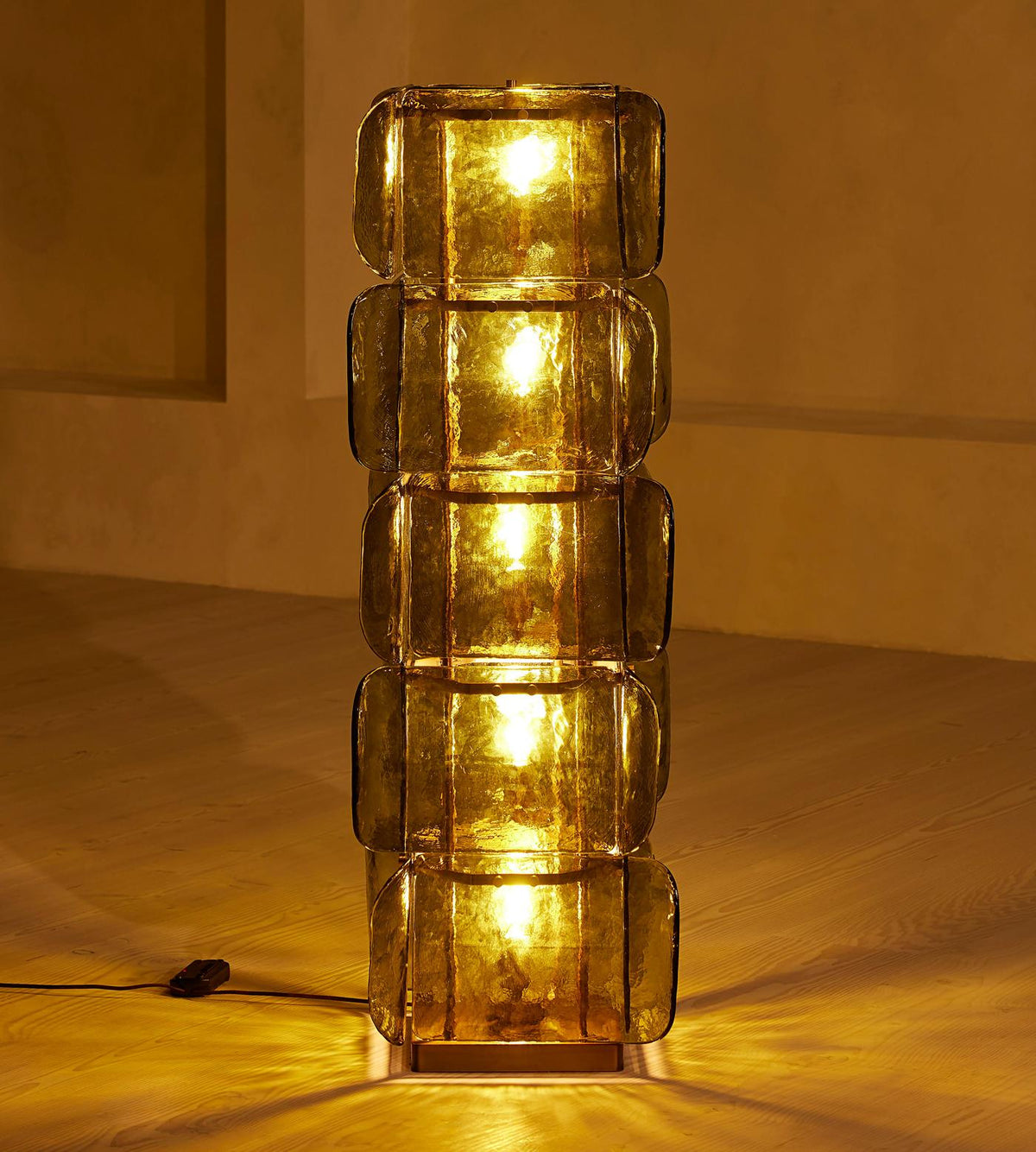 The white finish of the Cubo Totem Floor Lamp.