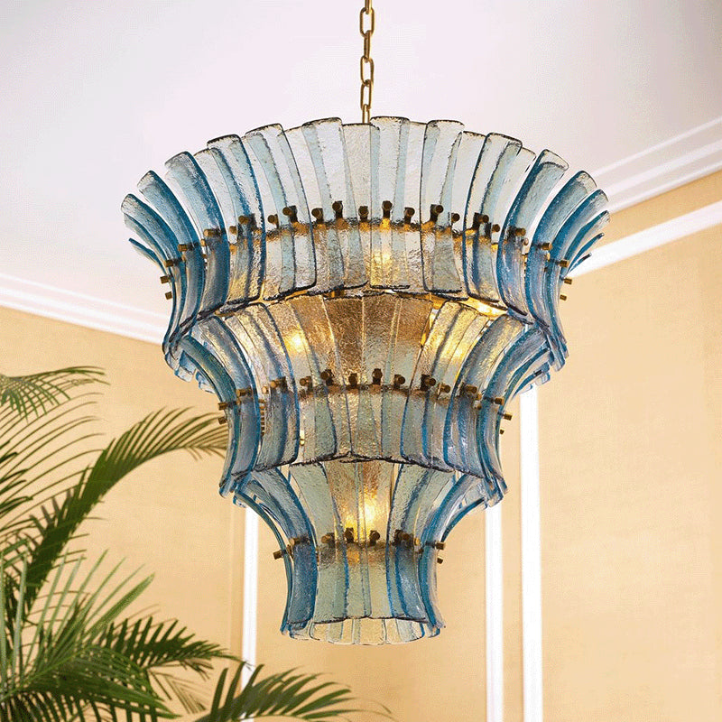 Side profile of the Fontana charcoal glass chandelier against a neutral wall.