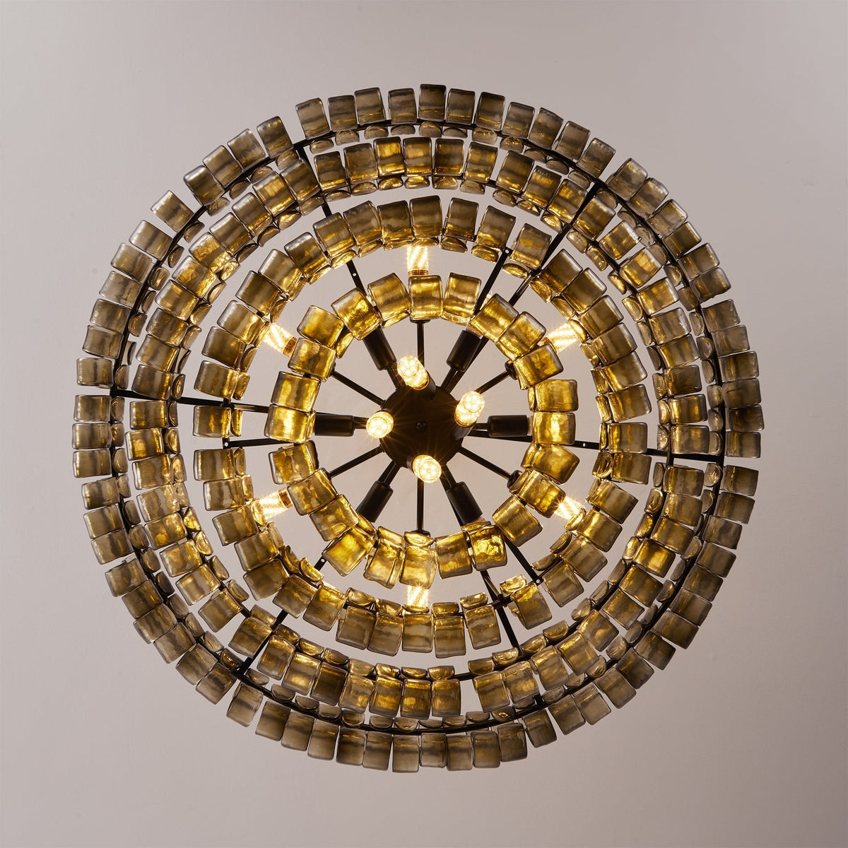 Close-up of light refracting through the textured glass tiles.
