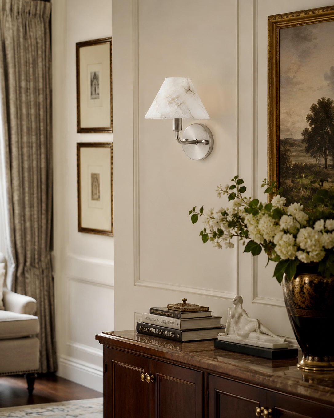 Gilda Alabaster Wall Sconce shown in the black finish option.