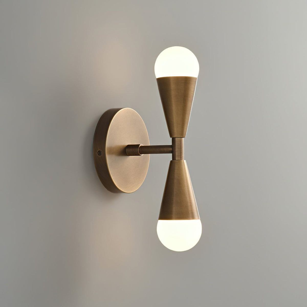 Harlan Gooseneck Sconce illuminated with a vintage-style Edison bulb.