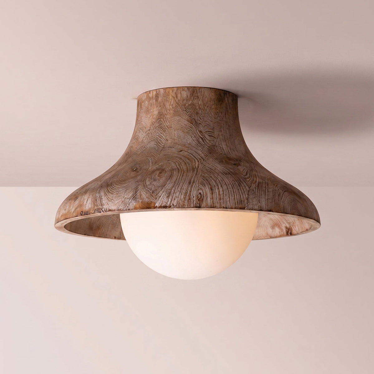 Close-up of the fluted glass shade and wooden base of the Hollis light.