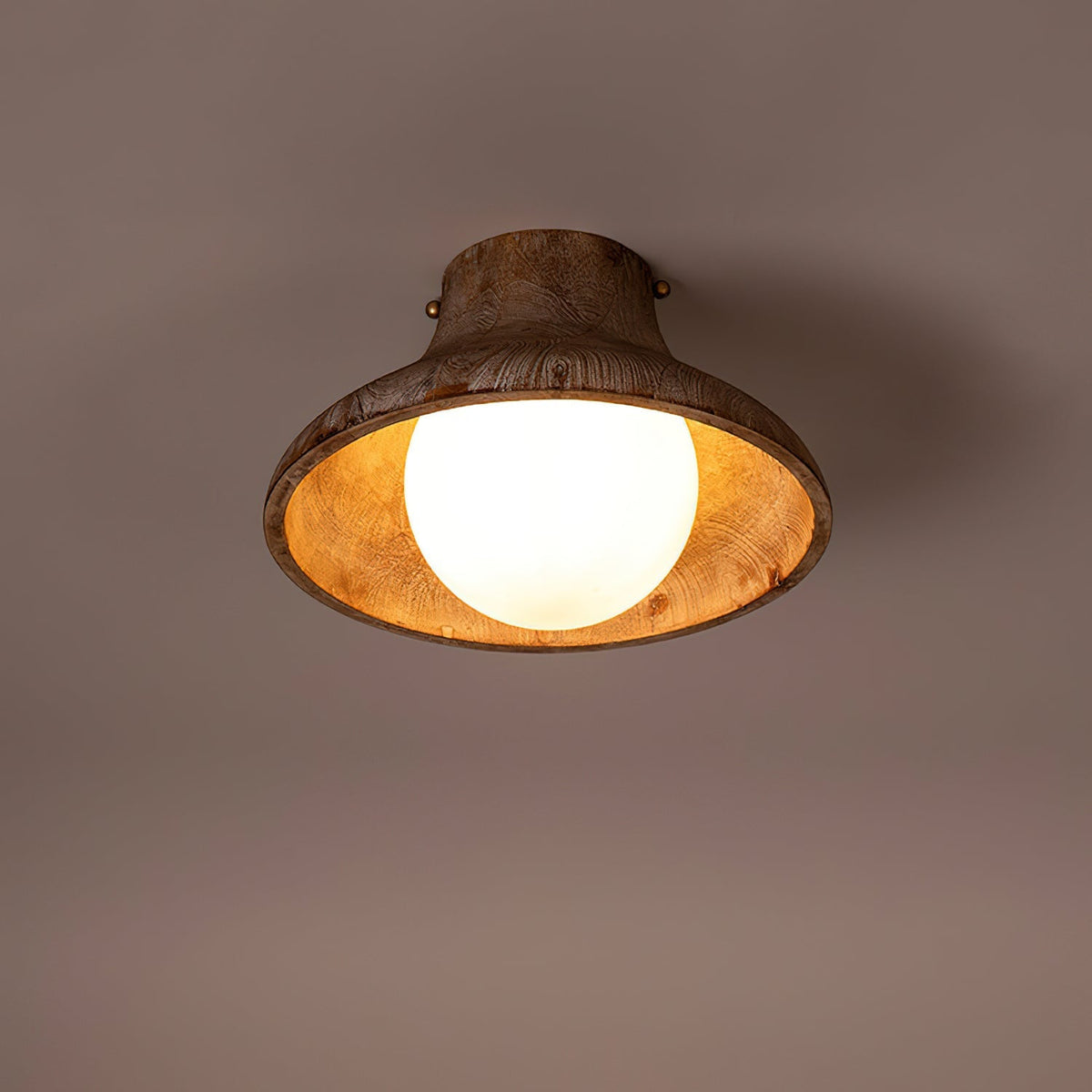 The Hollis Fluted Flush Mount illuminated, casting a warm, ambient glow.