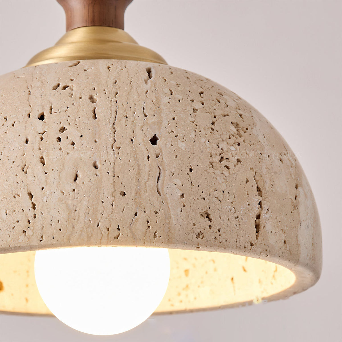 Lifestyle image of the Enora pendant light in a modern living room setting.