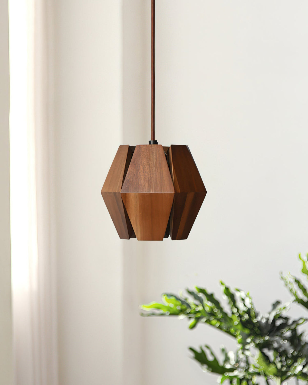 Close-up of the natural walnut wood grain on the Kaden Pendant Light's slats.