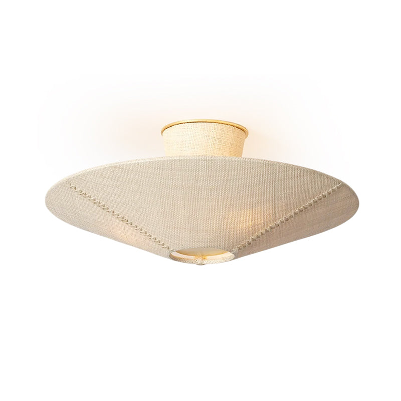 A detailed view of the bottom of the Ketan Semi Flush Mount, showing the bulb placement.