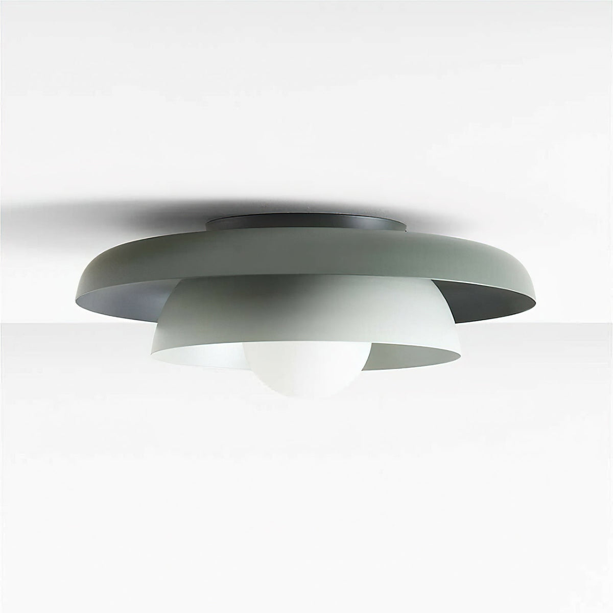 View of the flush mount from below, showing the two light sources.