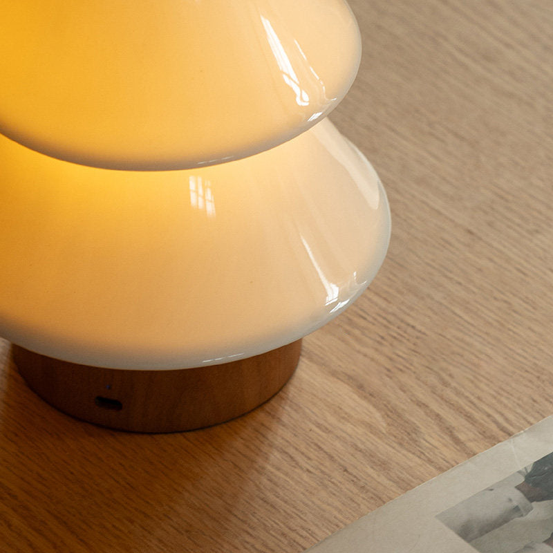 Close-up on the touch switch functionality of the lamp.