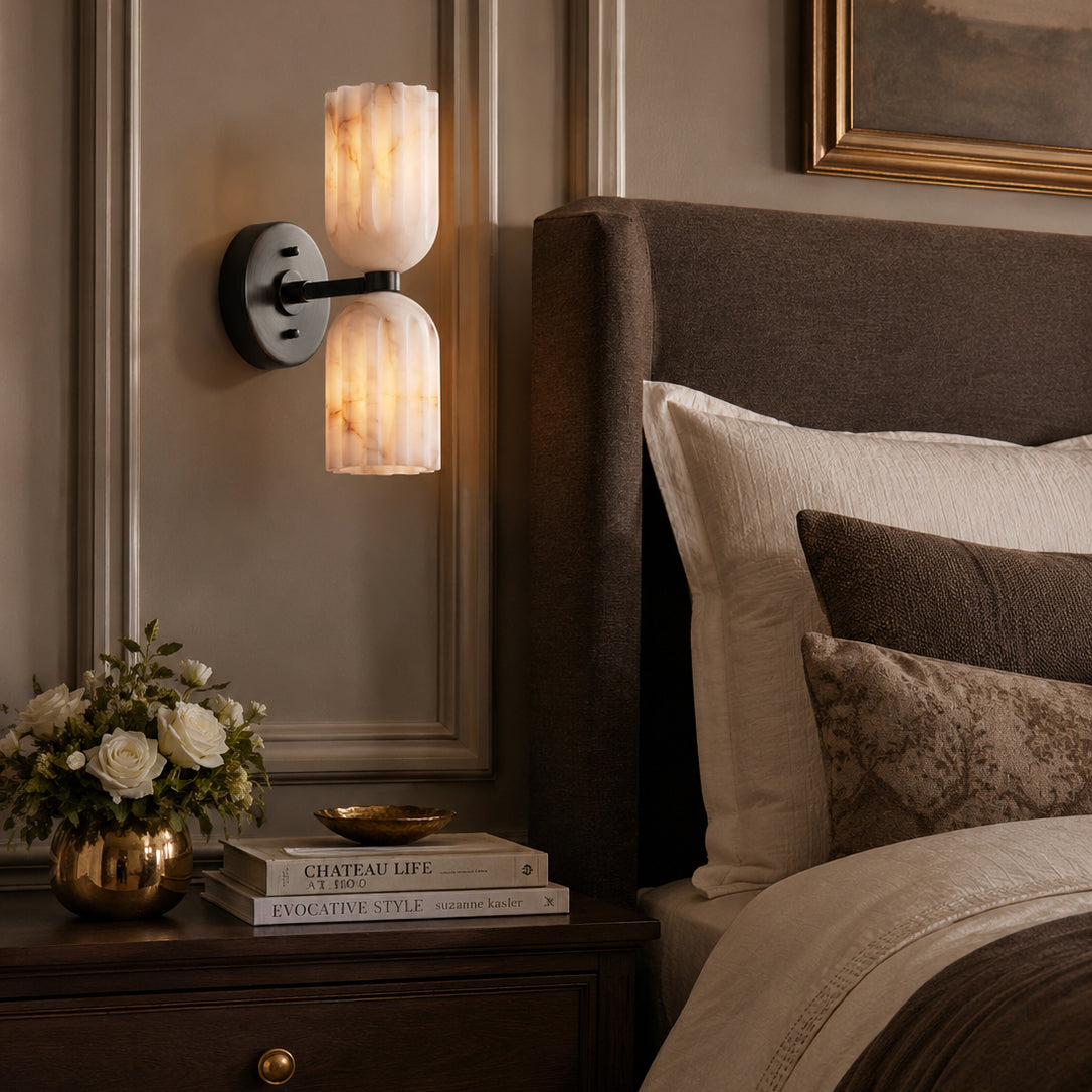Piermont Alabaster Wall Sconce with a sleek black finish.