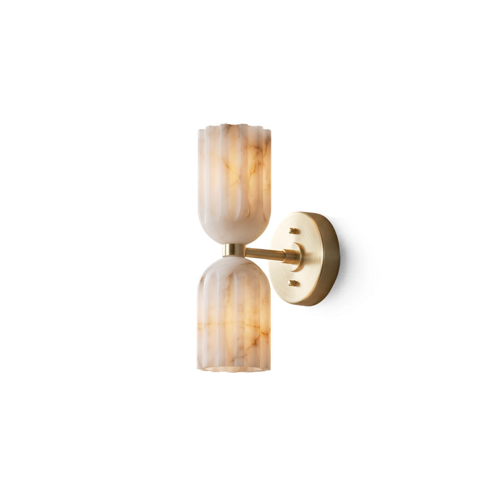 Piermont Alabaster Wall Sconce with brass finish against a neutral wall.