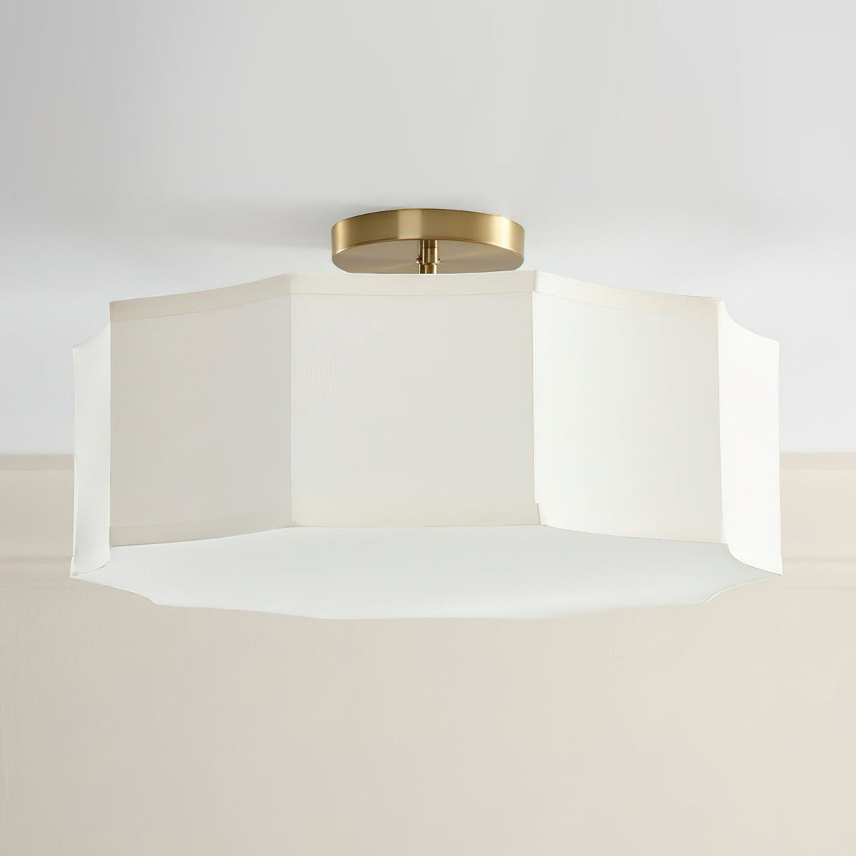 Prescott Linen Flush Mount installed in a modern traditional bedroom, providing warm ambient light.