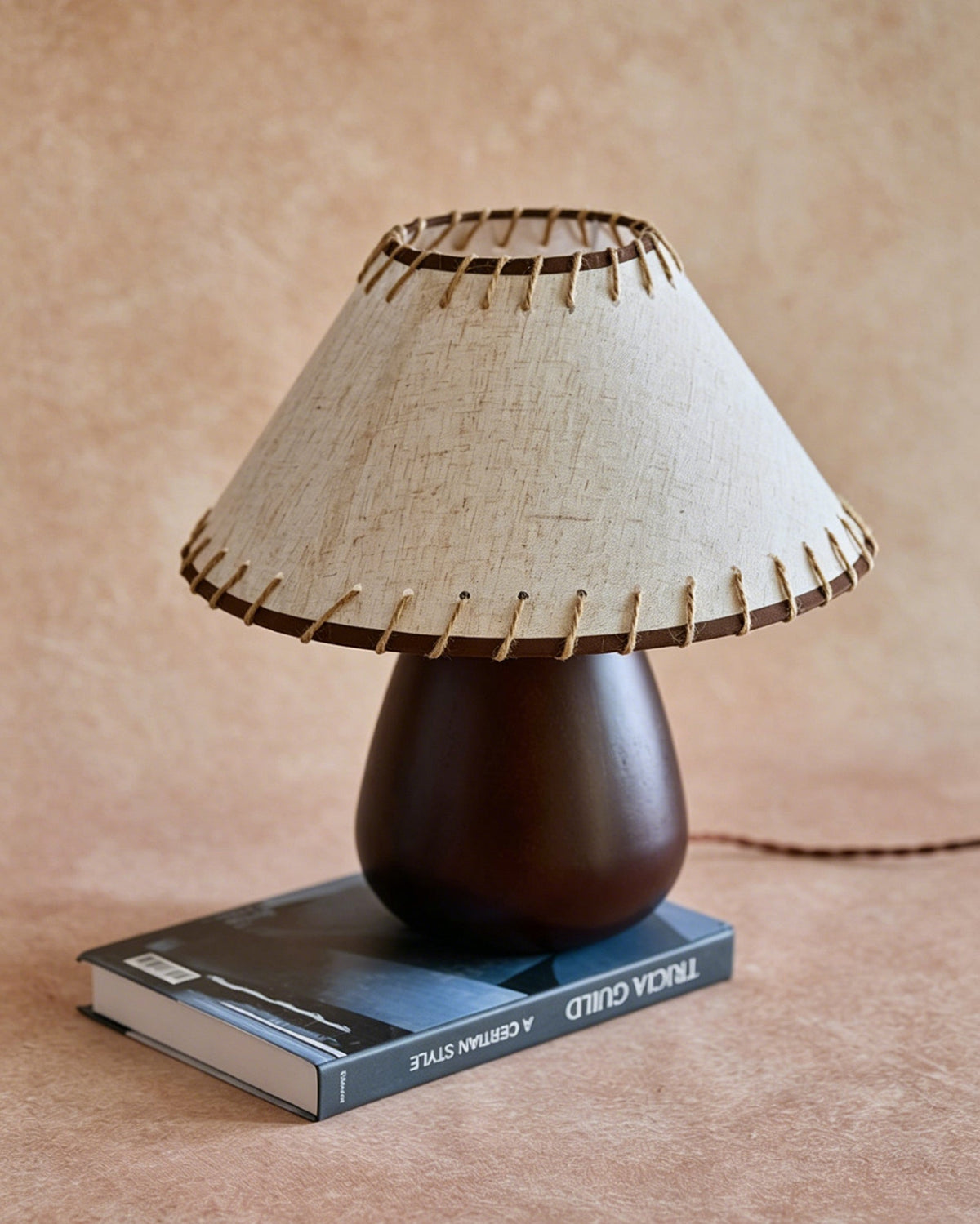 Side profile of the Douglas lamp showcasing its conical shade and wood base.