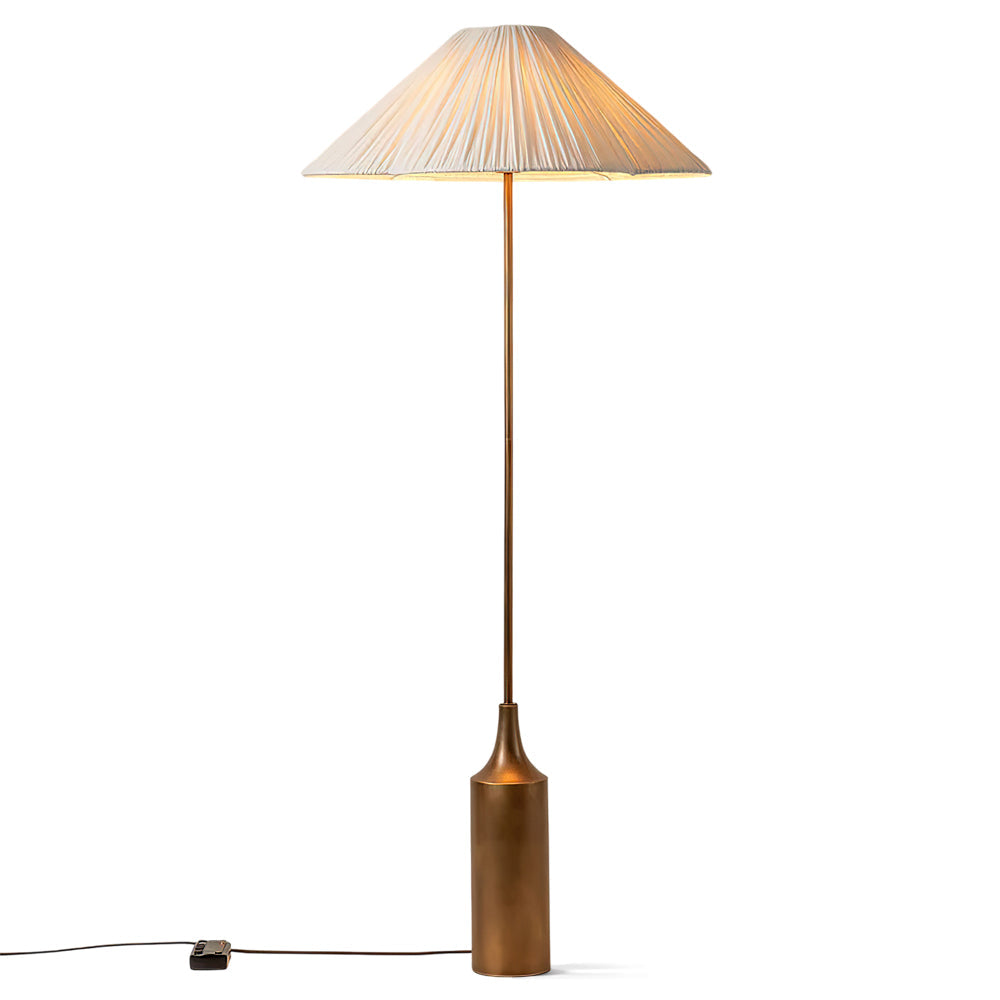 Sierra Linen Floor Lamp with a gold metal base and a wide, white pleated shade.