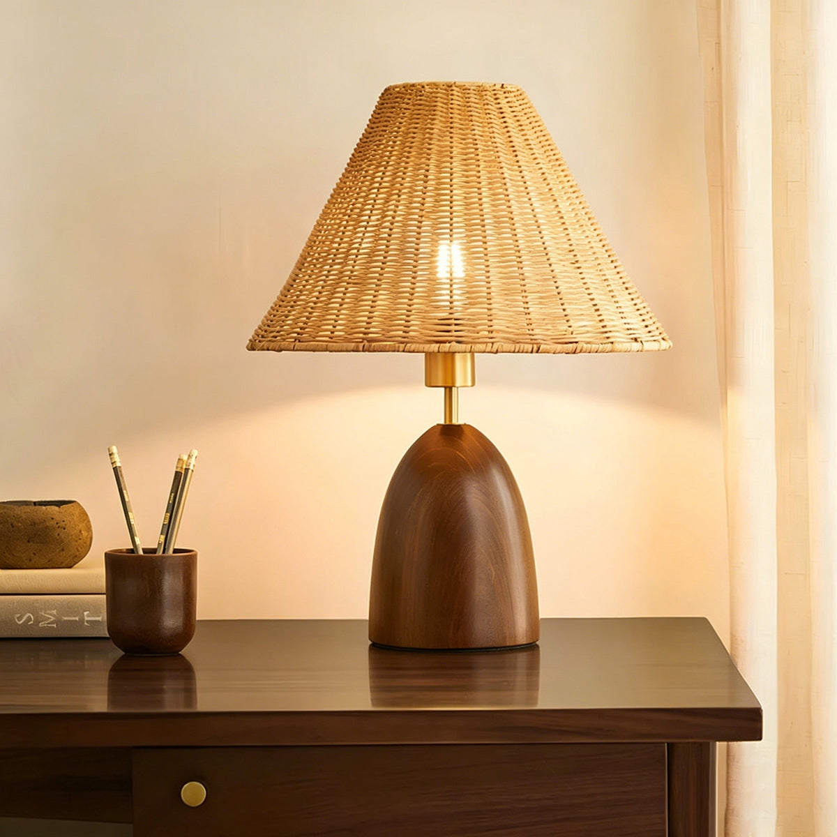 Detail shot of the solid walnut stained wood base of the Suri Table Lamp.
