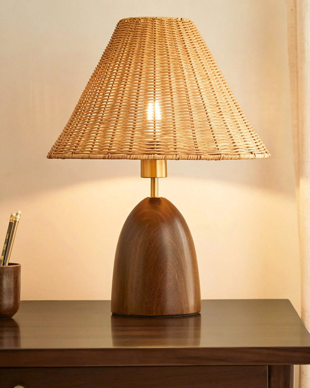 Dimensions of the Suri Rattan Table Lamp displayed on an image.