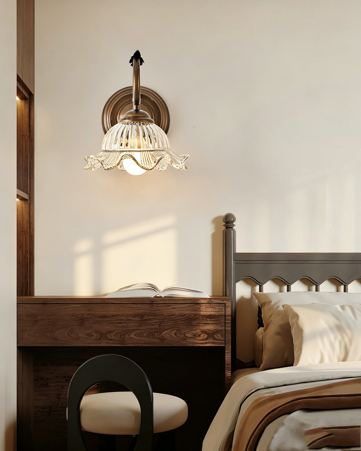 A pair of Sutton Wall Sconces flanking a master bedroom headboard.