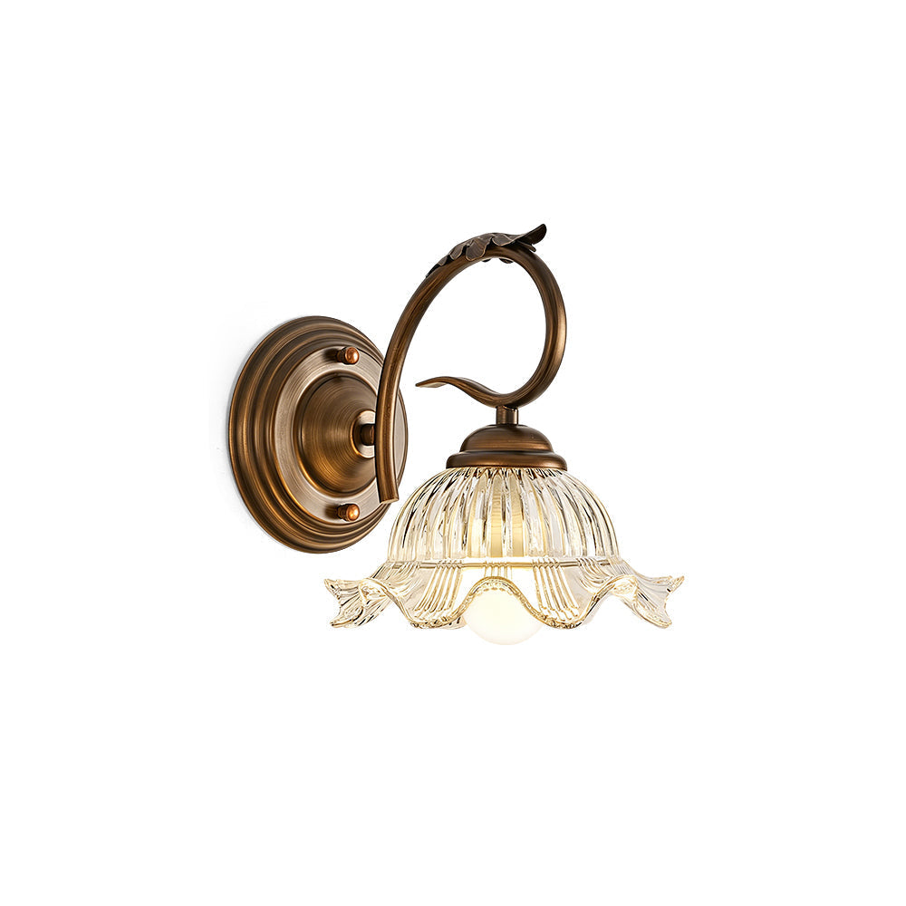Sutton Glass Wall Sconce with ribbed clear glass shade and bronze finish.