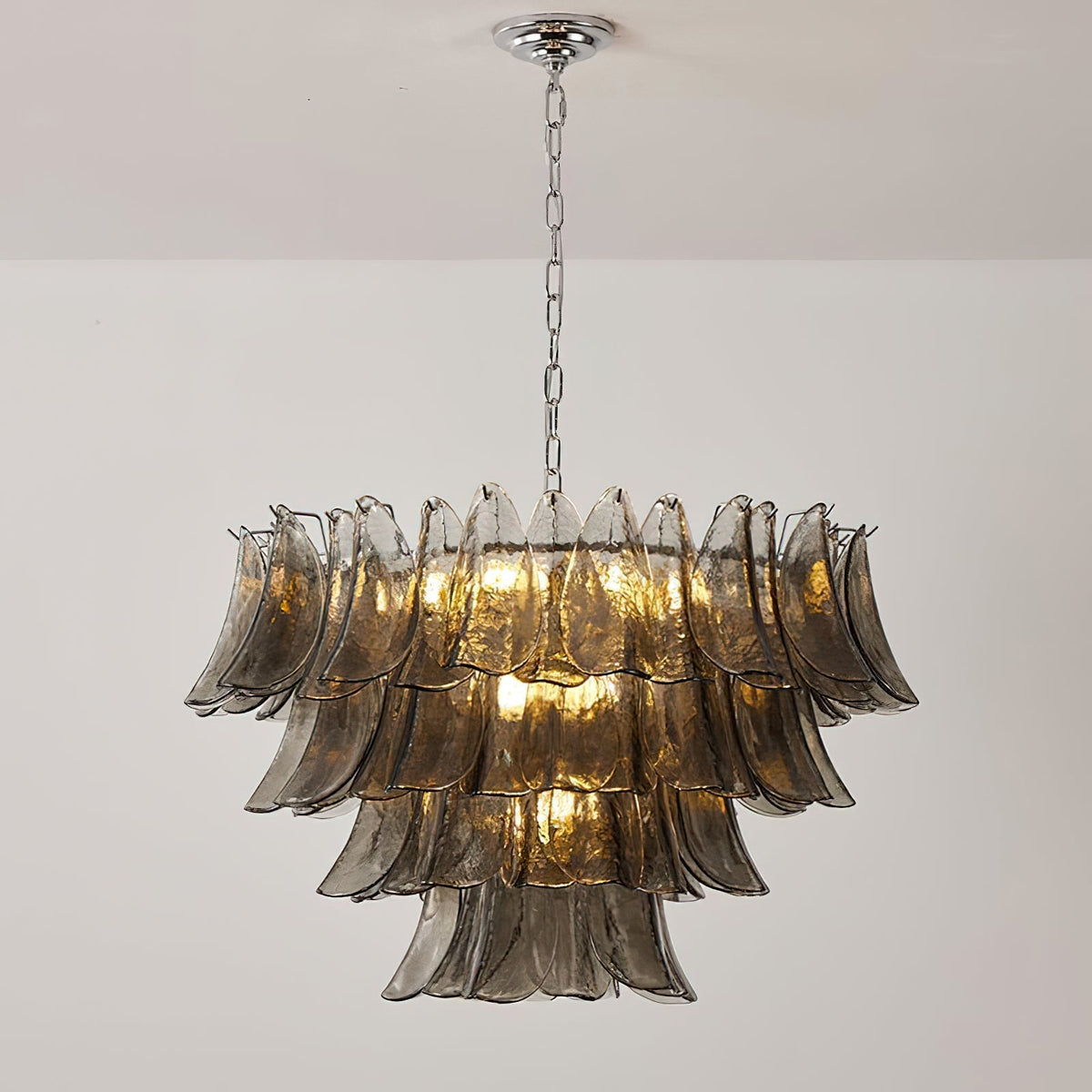 Close-up of the layered smoke gray glass plates of the Vivienne chandelier.