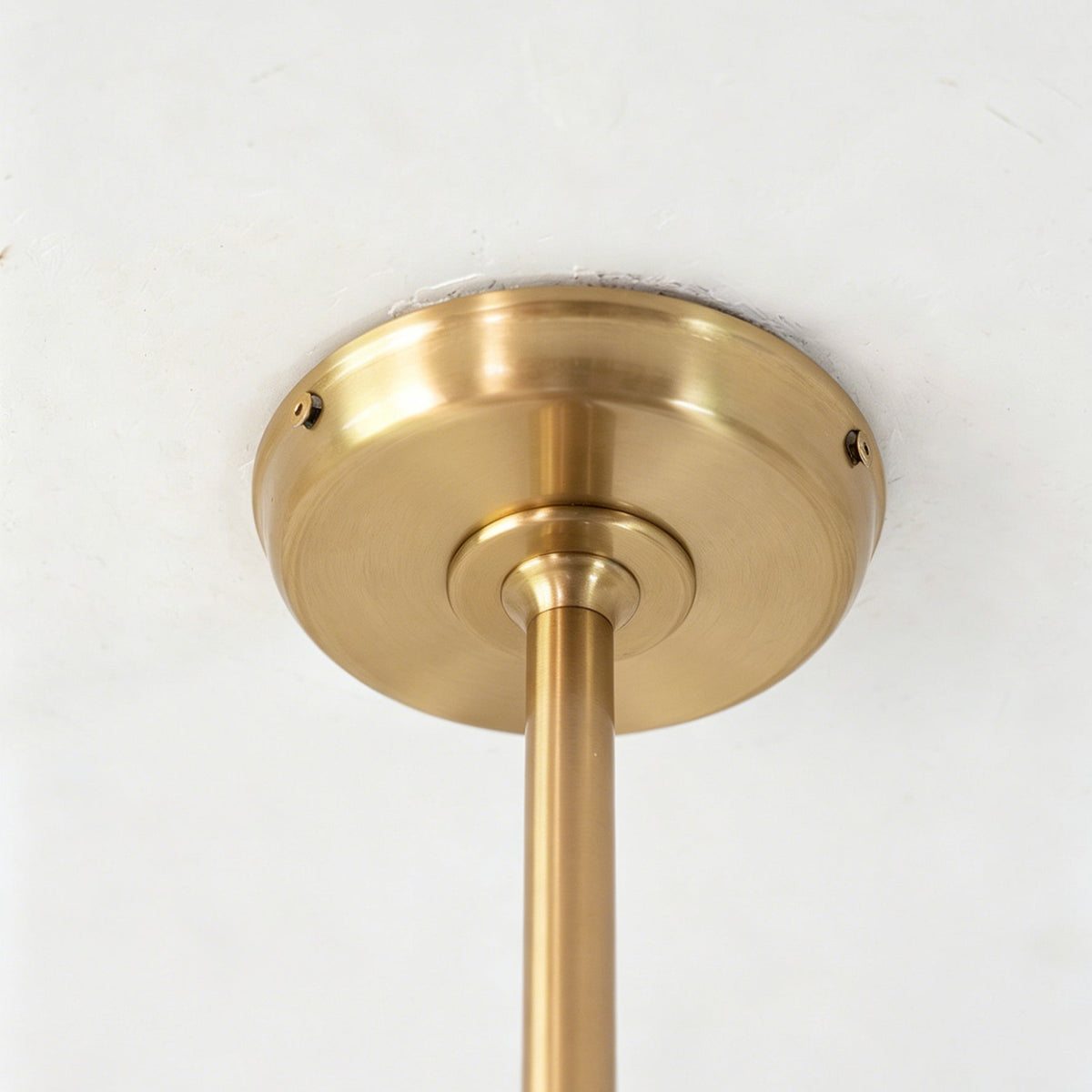 Another angled view of the Zane pendant light, emphasizing its fluid, kinetic design.