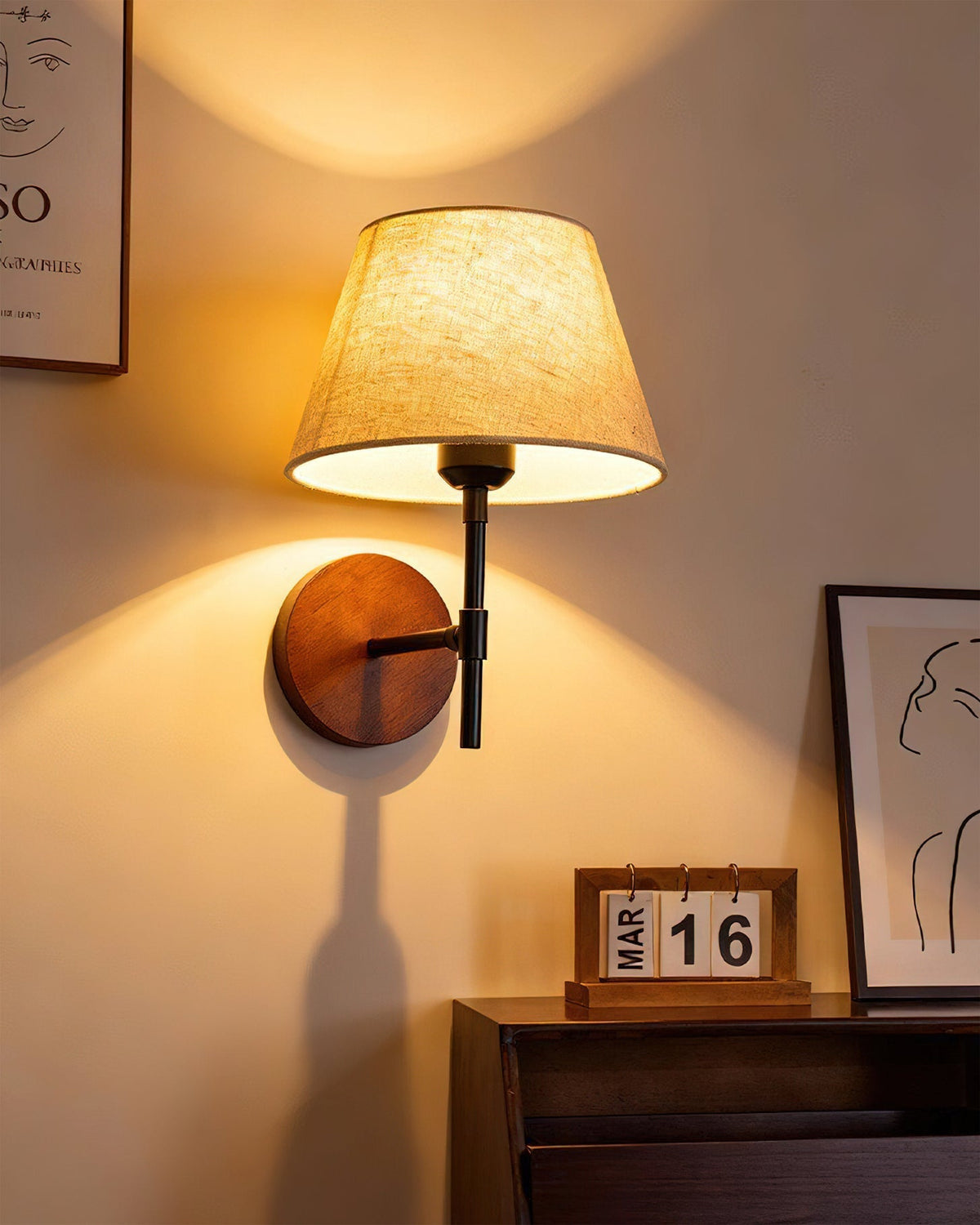 Dimensions of the Dodie Wall Light displayed with measurement lines.