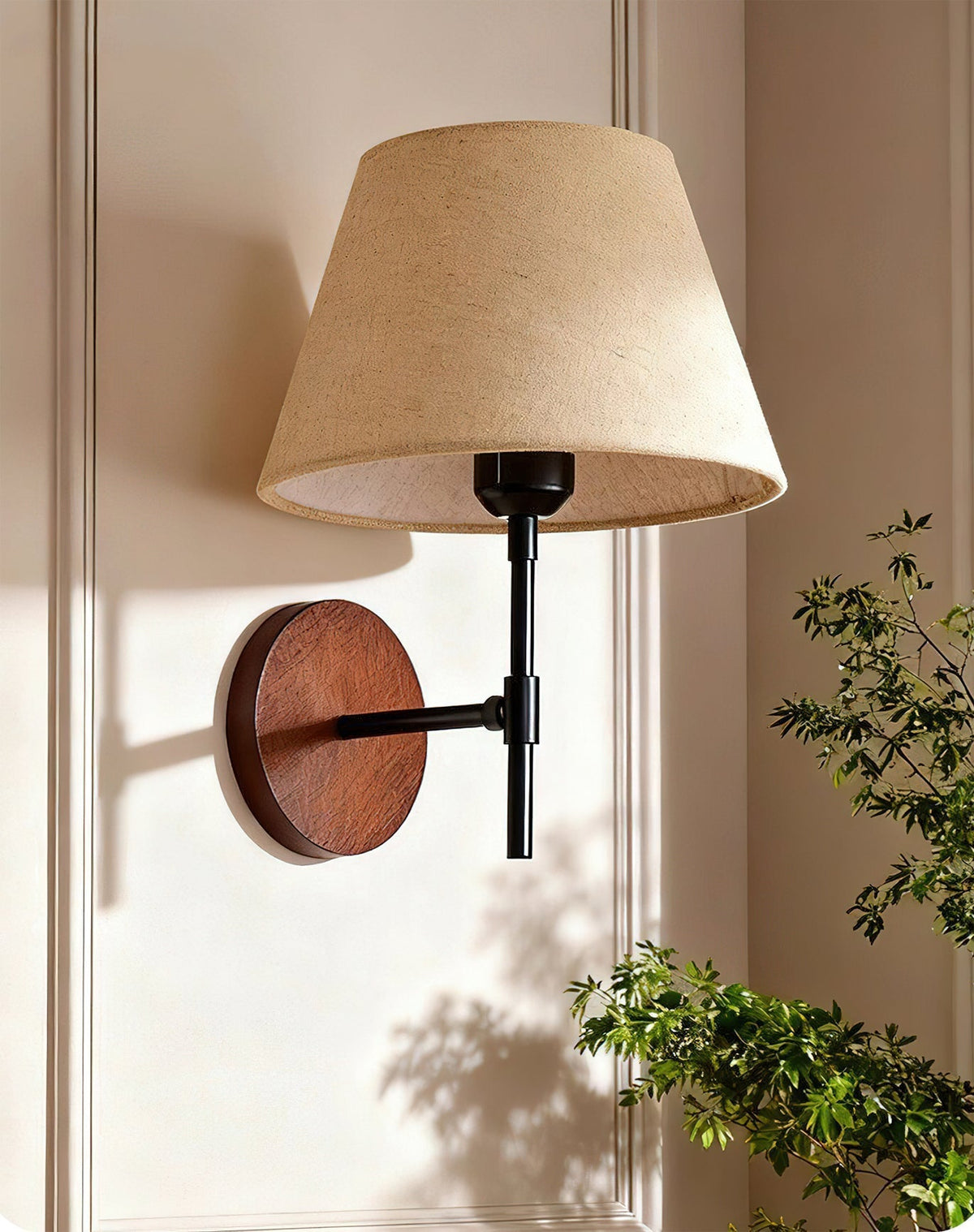 Dodie Wall Light shown in a Japandi-style living room setting.