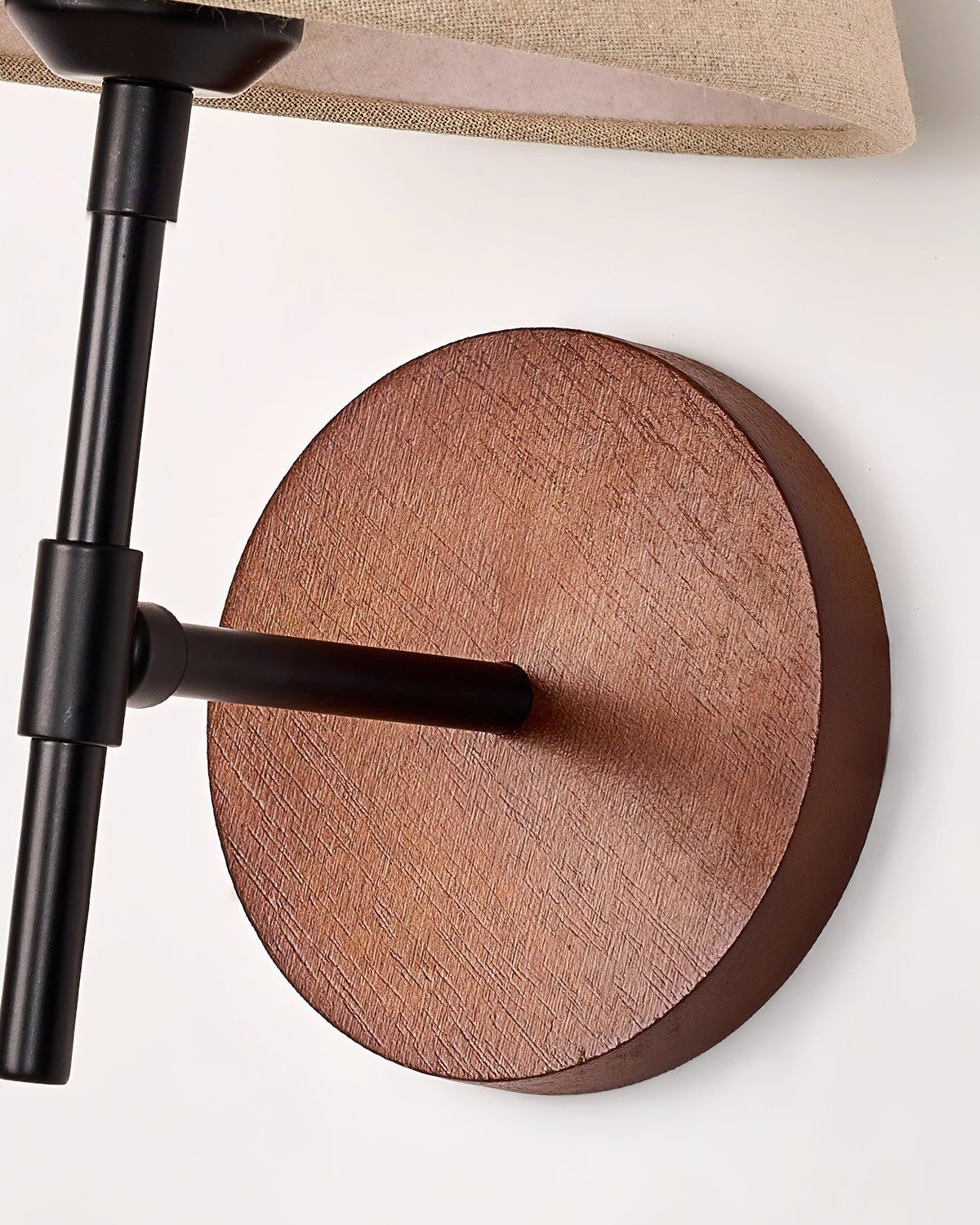 The beige and walnut color combination of the Dodie Wall Light.