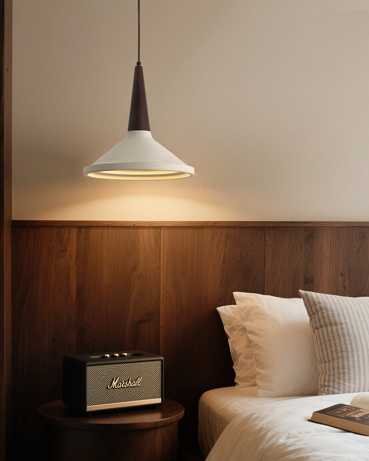 Doherty Pendant Light hanging above a modern dining table.