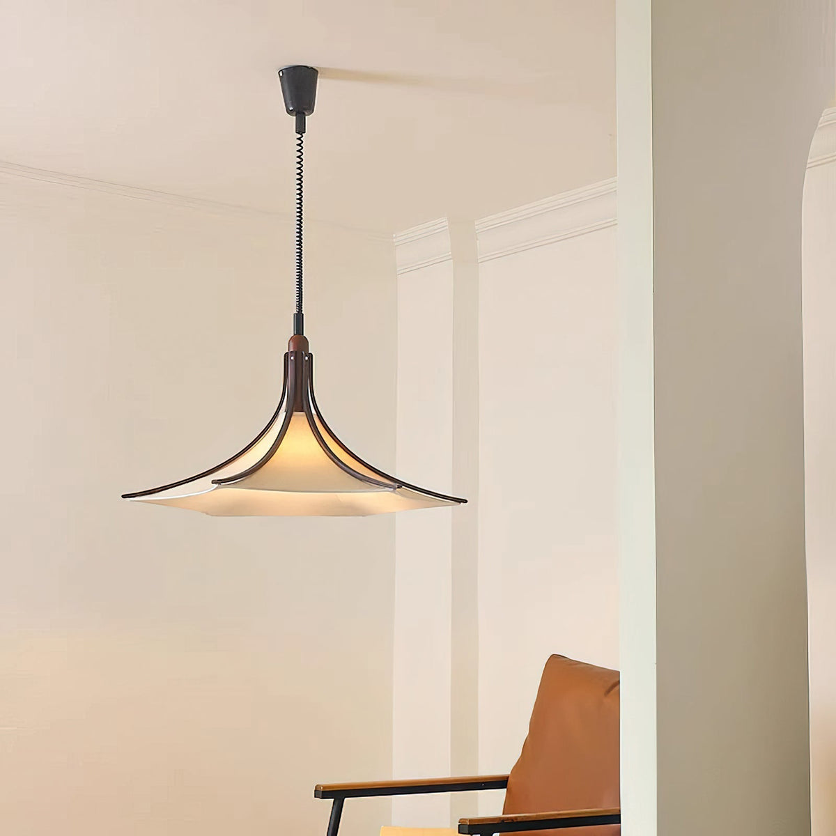Angled view of the Domus Pendant Light highlighting its sculptural form.