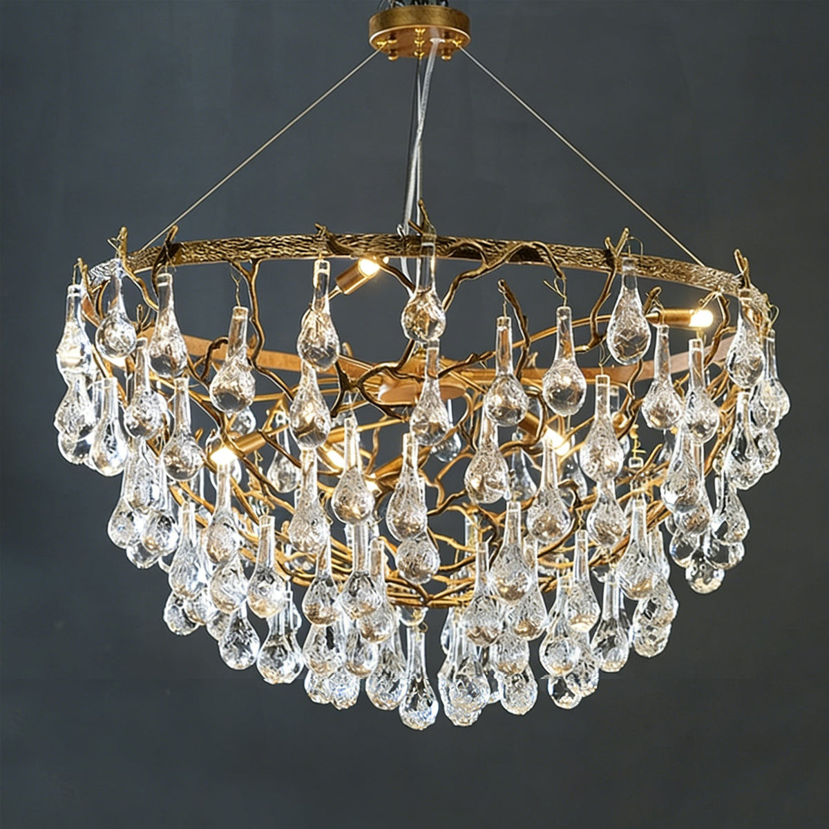 The Doris Chandelier shown in a grand foyer with high ceilings.