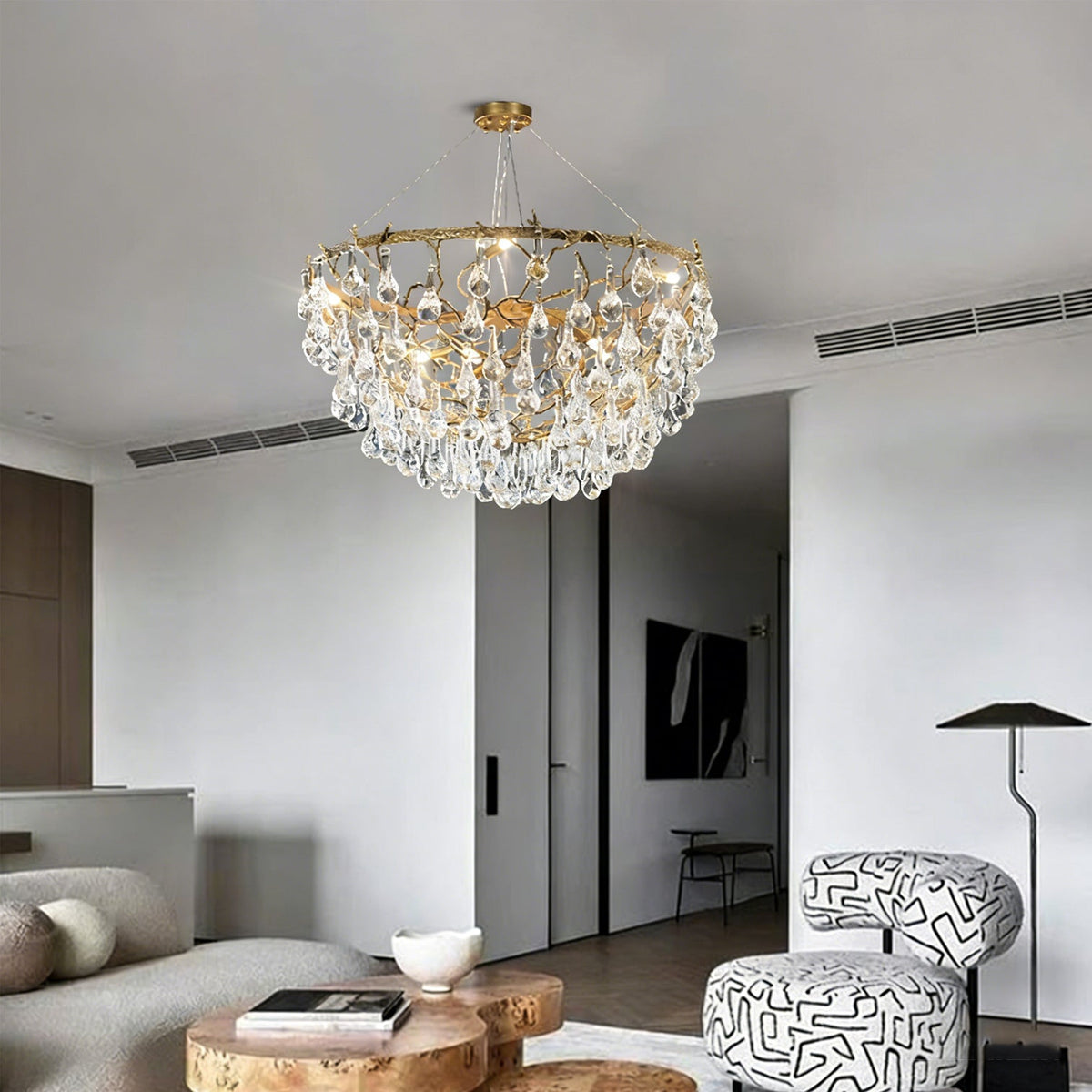 Detail shot of the clear glass drops on the Doris Chandelier, showing light refraction.