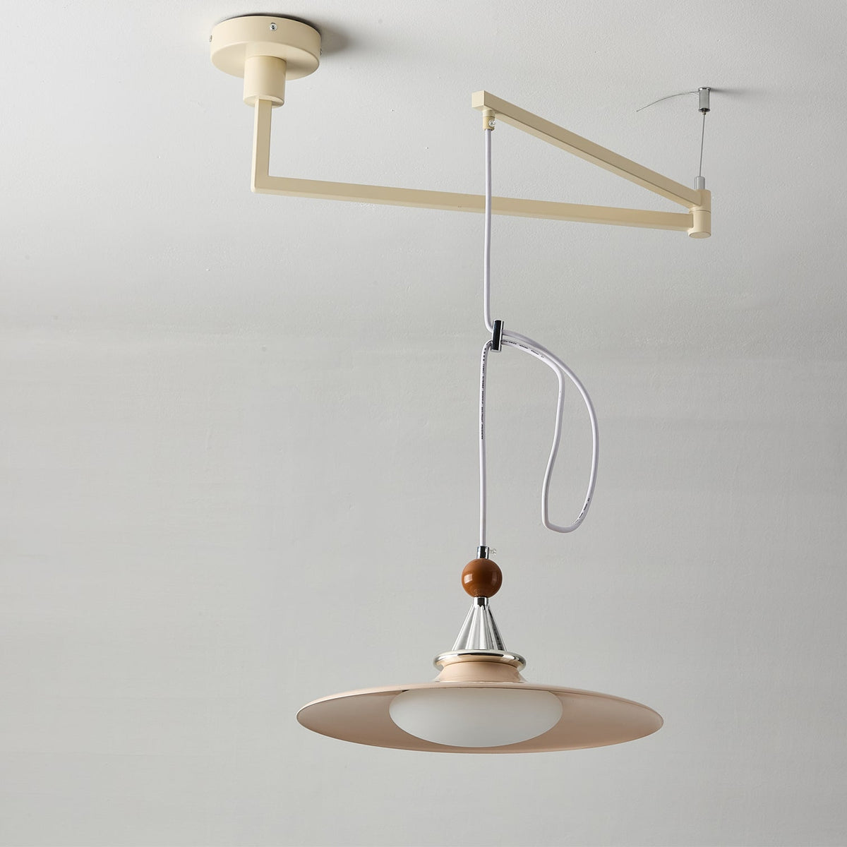 Eden pendant light in a bedroom setting.