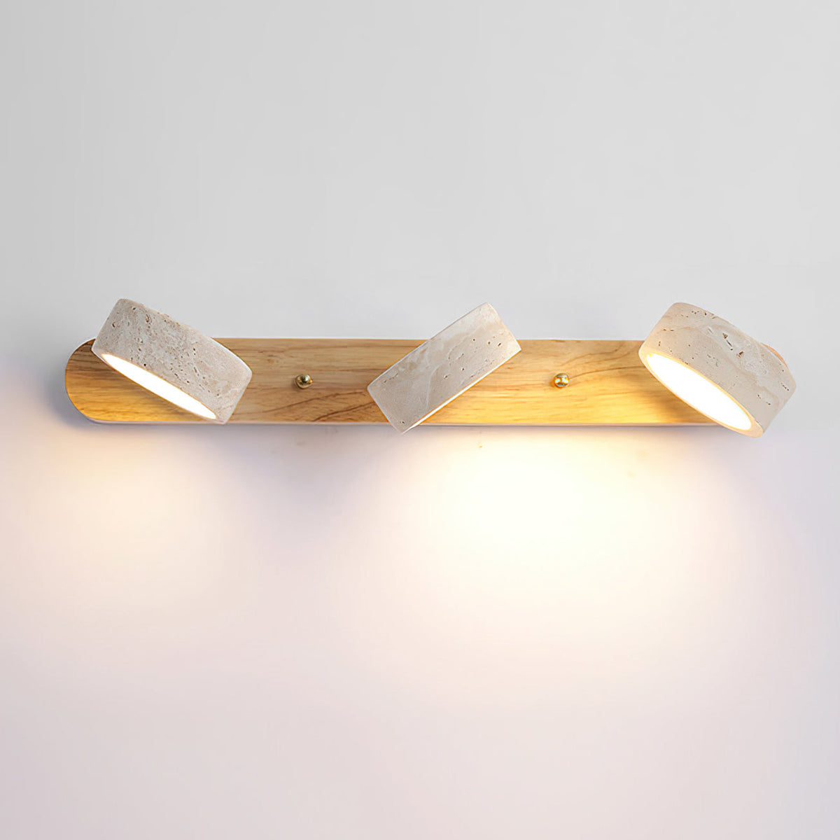 Full product shot of the 3-head lamp on a white background.