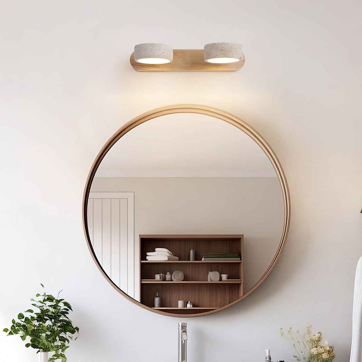 Detail of the wood accent on the Elias Travertine Wall Lamp.